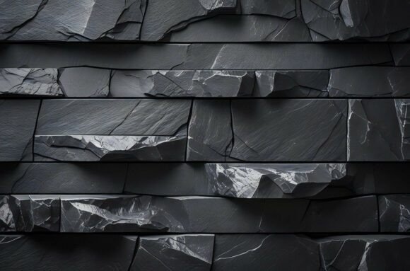 A Black Stone Wall with Many Cracks