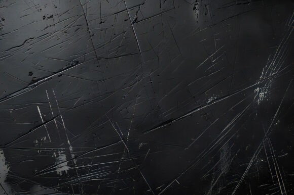 A Black Surface with Scratches: A Versatile Design Element for Modern Creatives