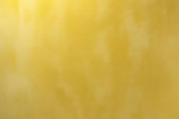 A Yellow Surface with a Light Shining: Enhancing Creative Projects with a High-Quality Background Image